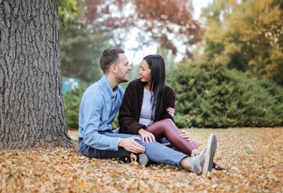 Couple sitting under the tree